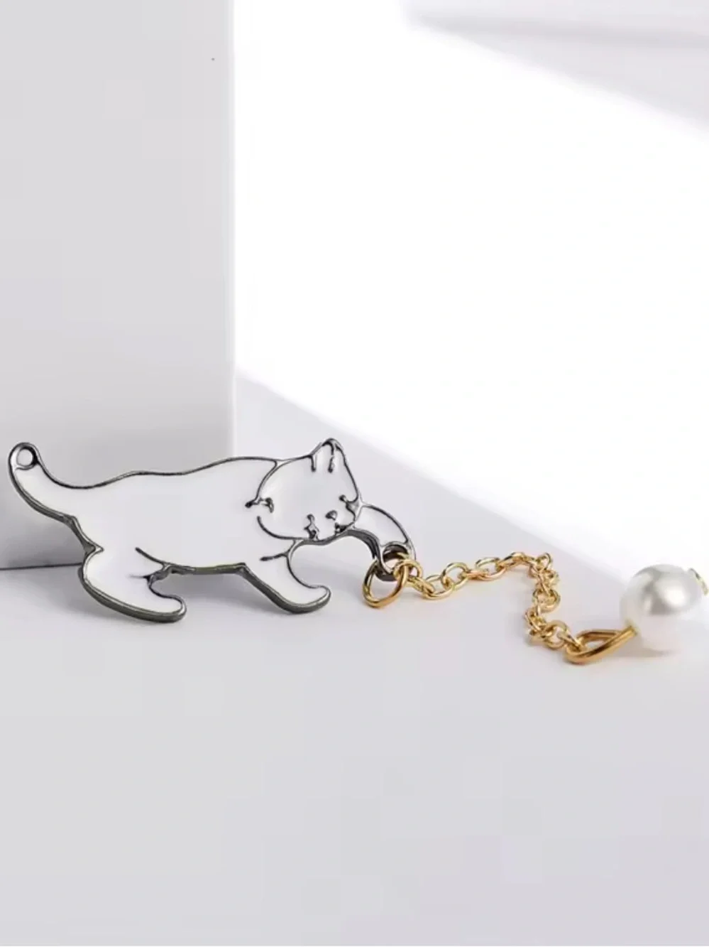 Anthropologie White Cat Enamel Brooch with Gold Tone Chain and Pearl